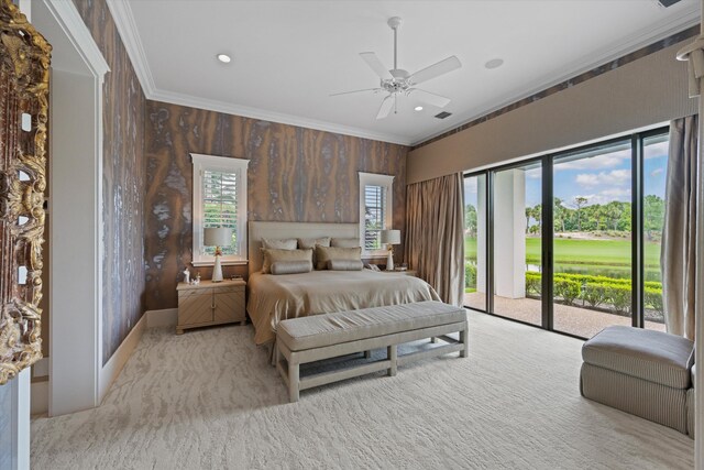 carpeted bedroom with ceiling fan, crown molding, access to exterior, and multiple windows