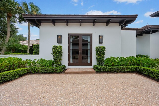 doorway to property featuring french doors