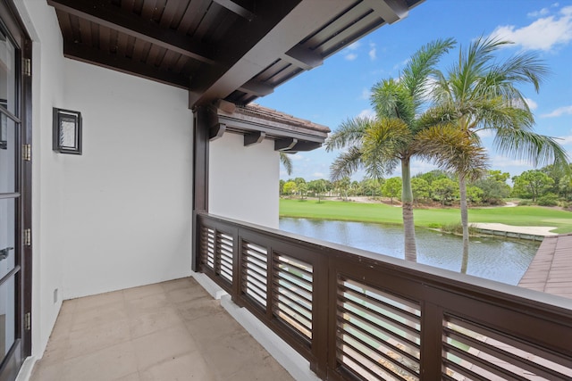 balcony featuring a water view