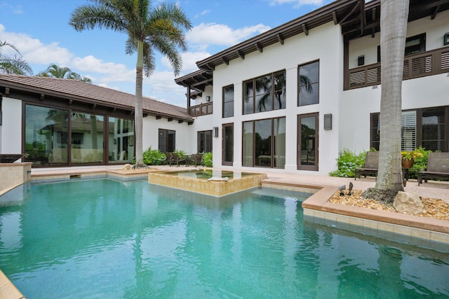 view of pool featuring a patio area