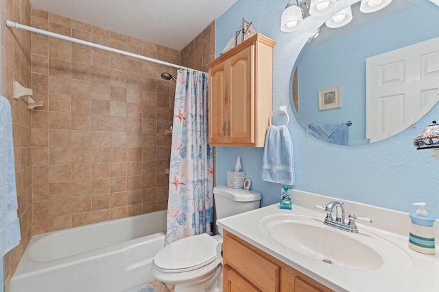 full bathroom with shower / tub combo with curtain, vanity, and toilet