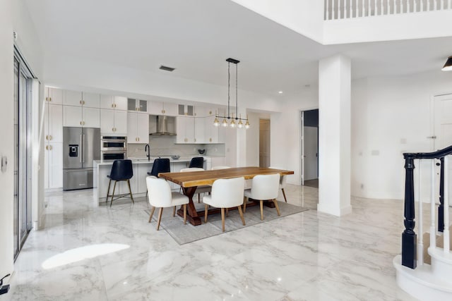 dining space with sink