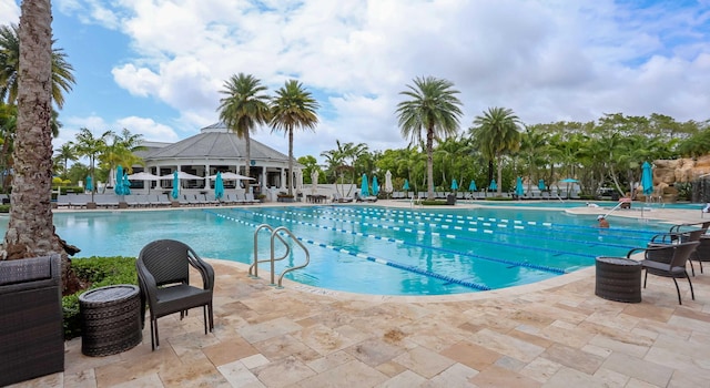 view of pool with a gazebo and a patio area