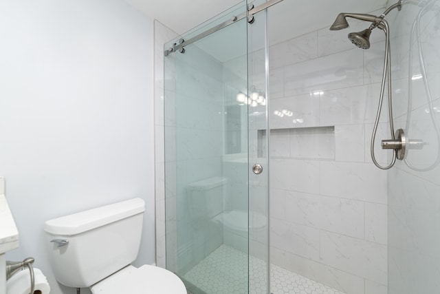 bathroom with walk in shower and toilet