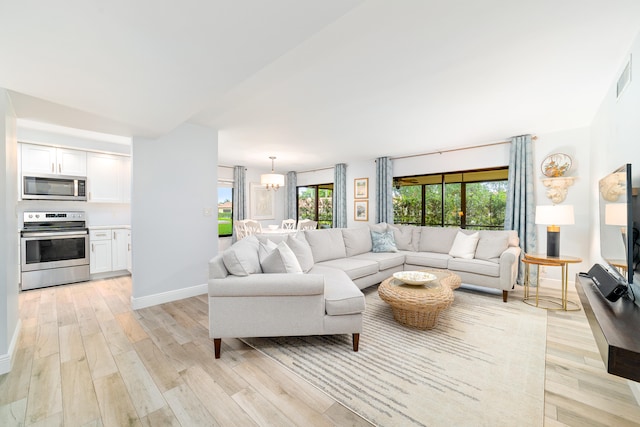 living room with light hardwood / wood-style floors