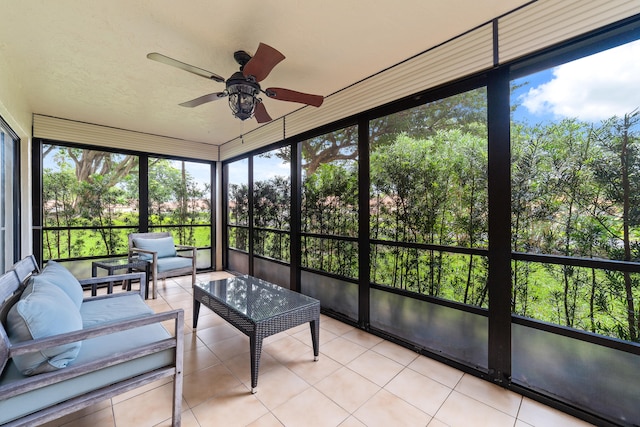 sunroom / solarium with ceiling fan