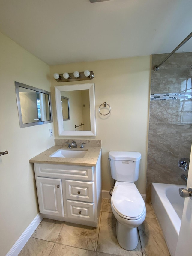 full bathroom featuring vanity, toilet, and tiled shower / bath