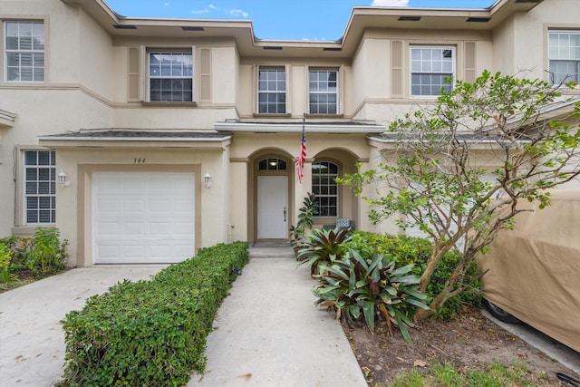 view of front of property with a garage