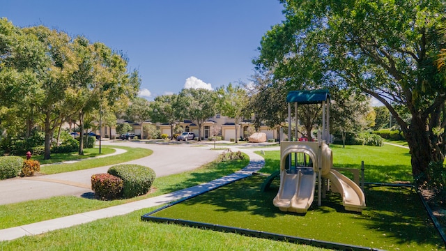 view of playground with a yard