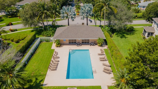 view of swimming pool with a patio