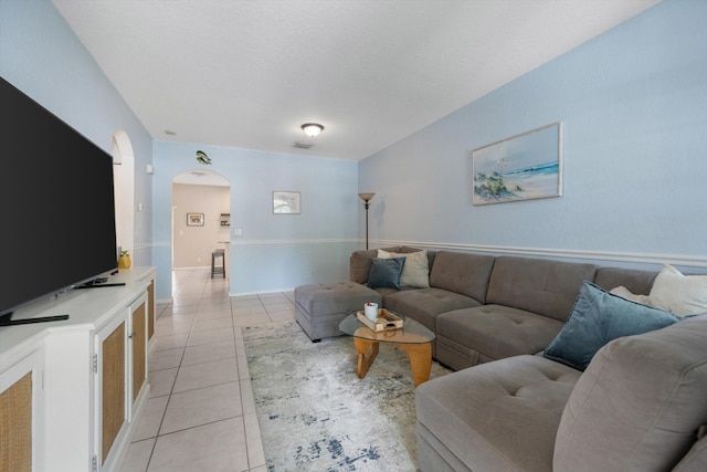 living room with light tile patterned floors