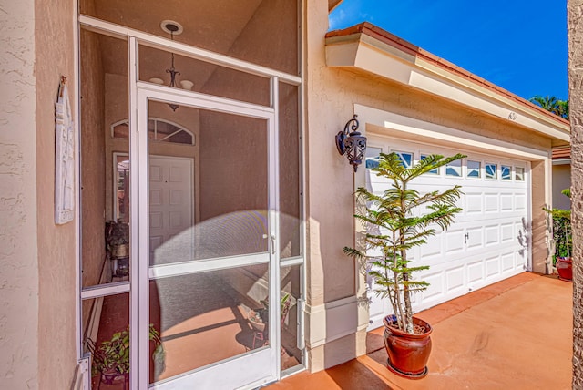 entrance to property with a garage