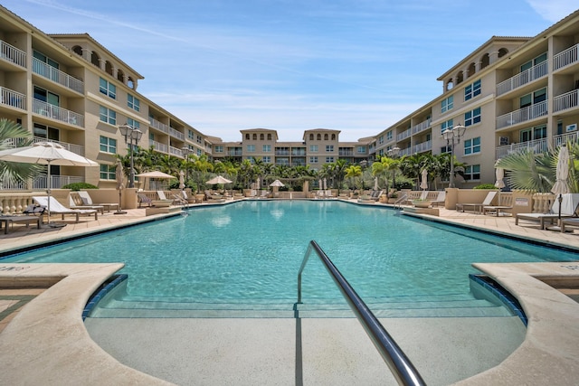 view of swimming pool featuring a patio area