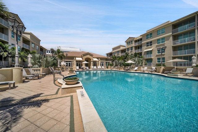 view of swimming pool featuring a patio