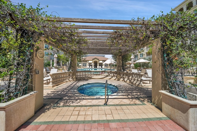 view of swimming pool with a pergola and a patio