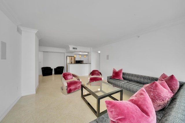 living room featuring crown molding