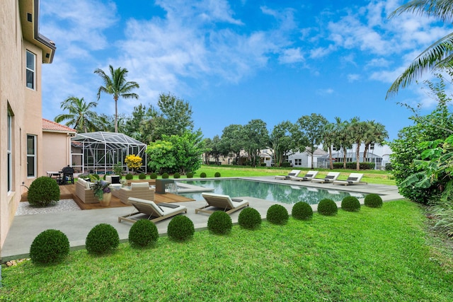 view of pool featuring a lanai, a water view, a lawn, and a patio area