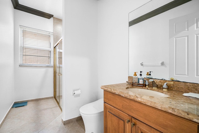 bathroom with vanity, toilet, walk in shower, crown molding, and tile patterned flooring