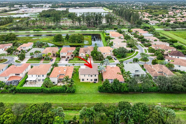 drone / aerial view with a water view