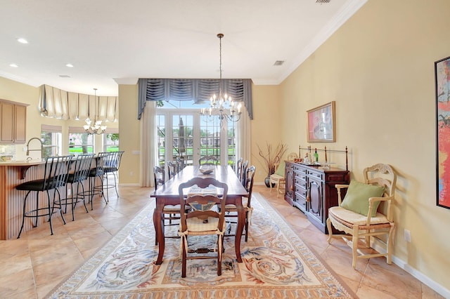 tiled dining room featuring an inviting chandelier, french doors, and crown molding