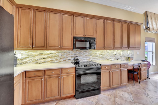 kitchen featuring black appliances and backsplash