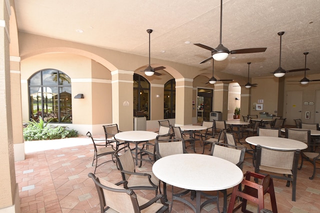 dining space with ceiling fan