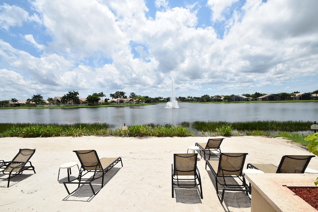 view of patio with a water view