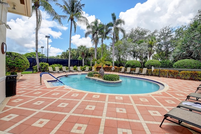 view of pool featuring a patio