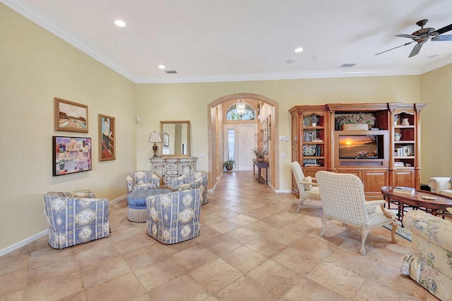 office area with ceiling fan and crown molding