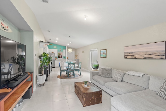 tiled living room featuring lofted ceiling