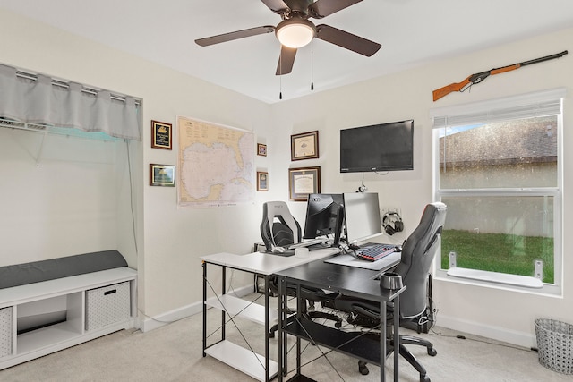 office featuring ceiling fan and light colored carpet