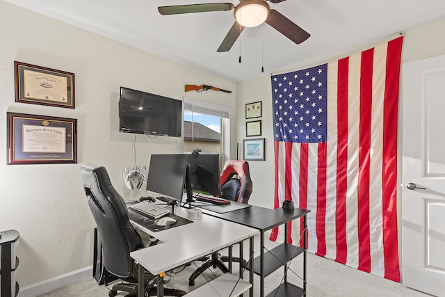 office featuring ceiling fan and carpet