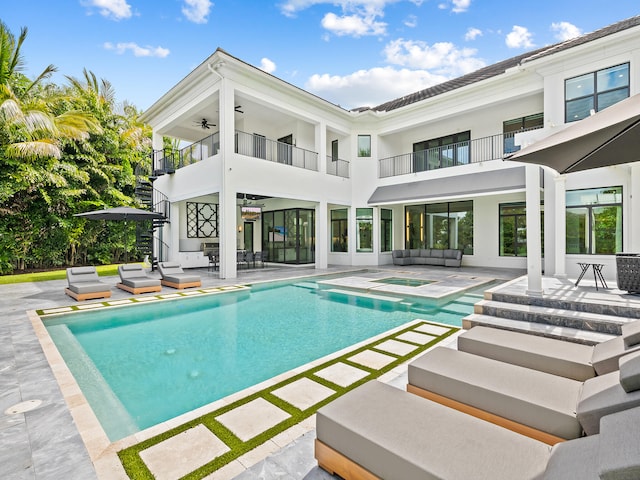 view of swimming pool featuring a patio area and an outdoor hangout area