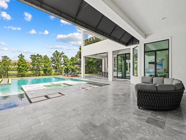 view of pool featuring a patio area