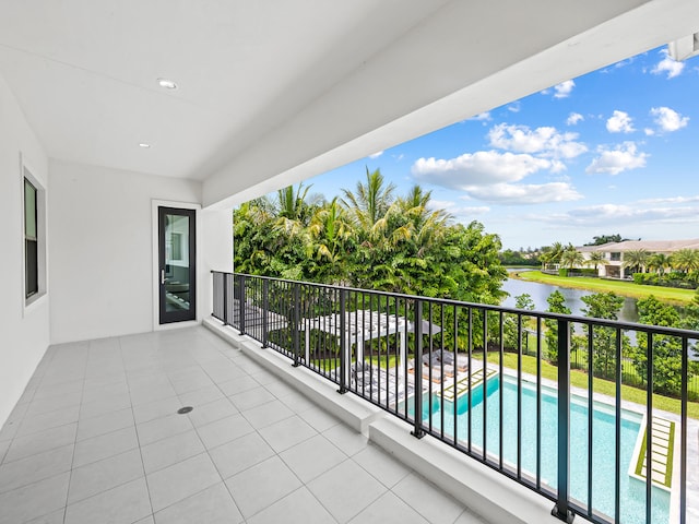 balcony featuring a water view