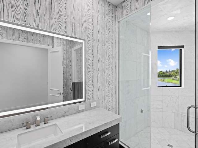 bathroom featuring vanity and walk in shower