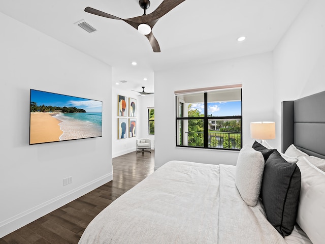 bedroom with dark wood-type flooring and ceiling fan