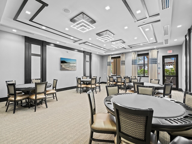 dining area featuring light colored carpet