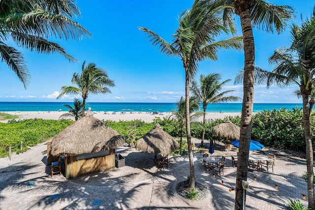 view of water feature with a beach view