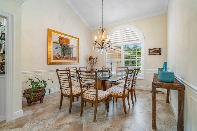 dining room with crown molding, lofted ceiling, and a notable chandelier