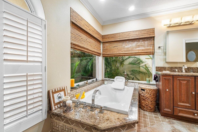 bathroom featuring vanity, a relaxing tiled tub, and ornamental molding