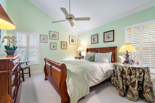 bedroom with vaulted ceiling, multiple windows, ornamental molding, and ceiling fan