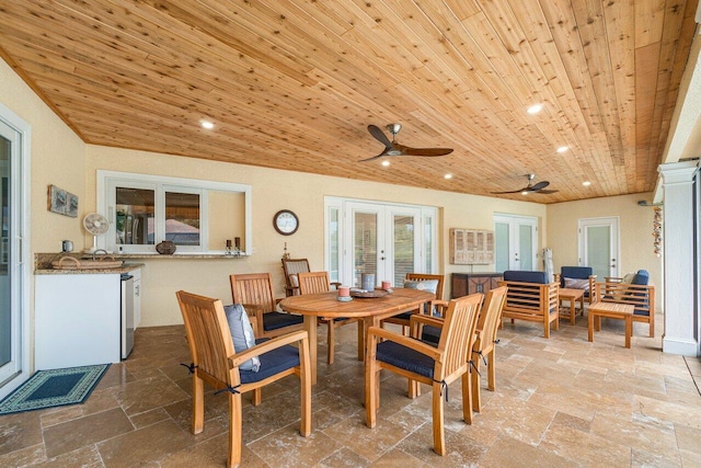 dining room with french doors, ceiling fan, lofted ceiling, and wood ceiling