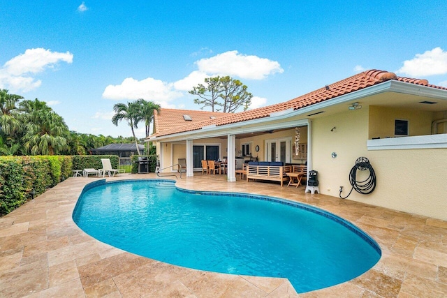 view of swimming pool with an outdoor hangout area, grilling area, and a patio area