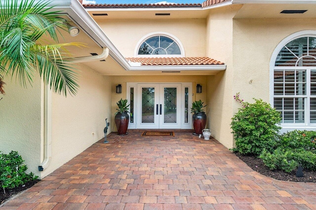 doorway to property featuring french doors