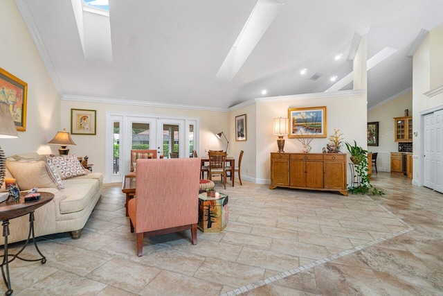 living room with a skylight, french doors, high vaulted ceiling, and ornamental molding