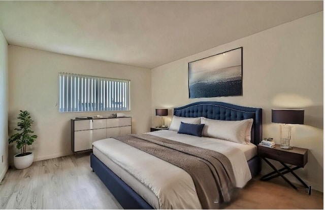 bedroom featuring light wood-type flooring