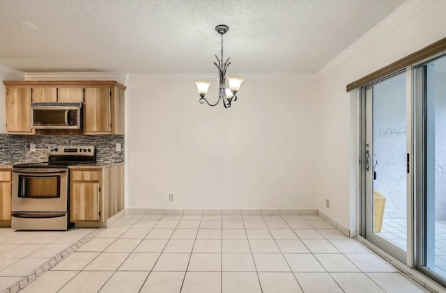 kitchen with ornamental molding, decorative light fixtures, an inviting chandelier, and appliances with stainless steel finishes