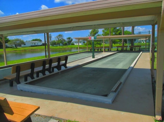 view of home's community with a water view