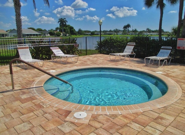 view of pool featuring a patio